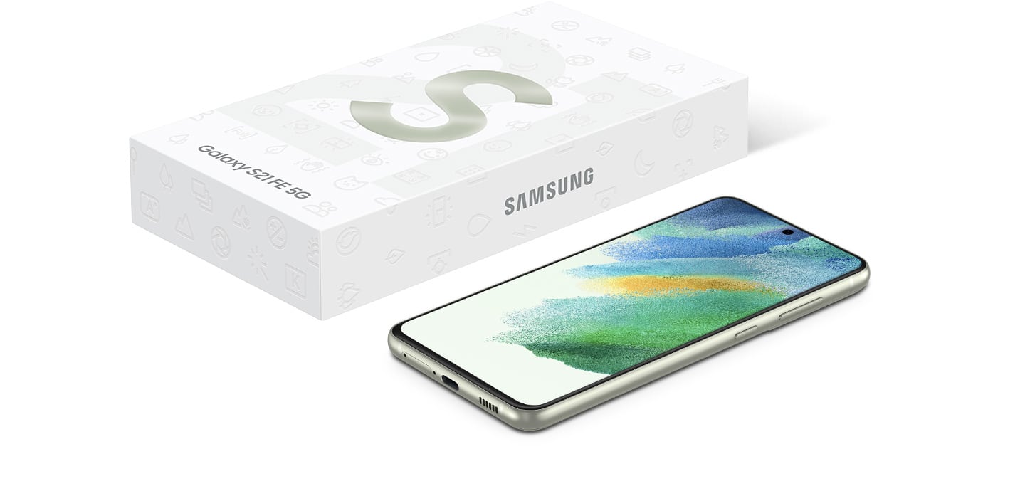 Galaxy S21 FE 5G next to its sleek minimalist packaging. 